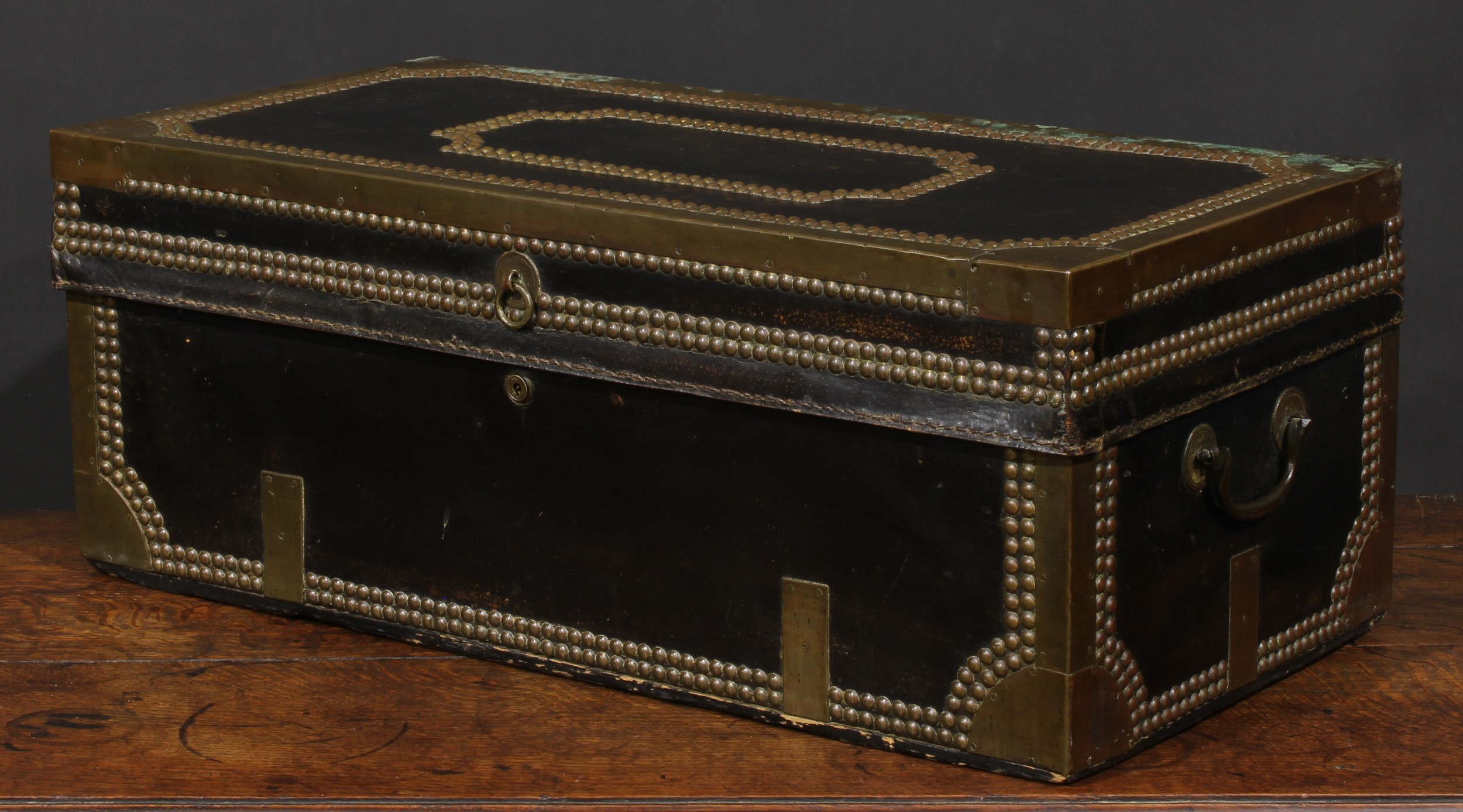 An early 19th century brass and studded leather mounted camphor travelling or coaching trunk, hinged - Image 4 of 5