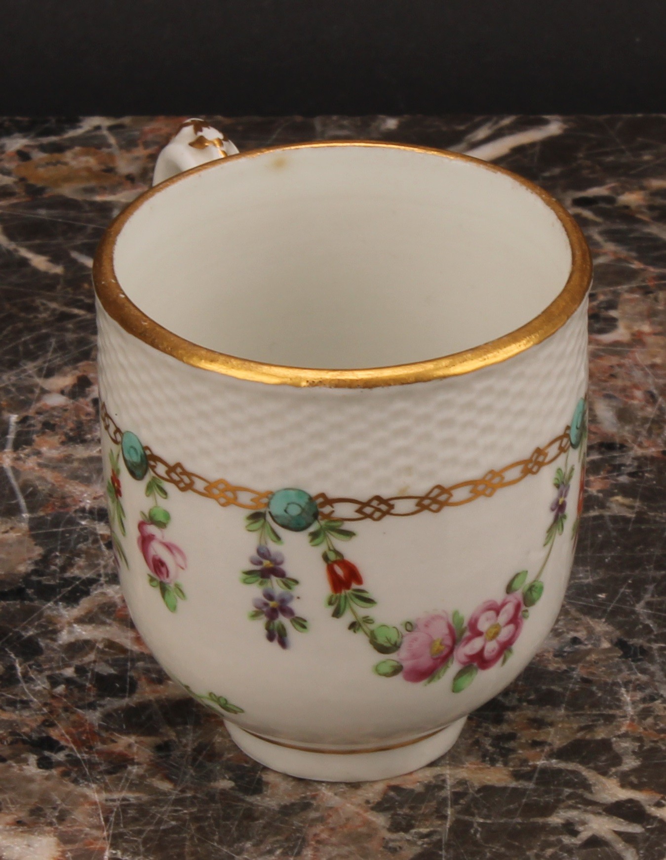 A Bristol coffee cup and saucer, basket weave moulded border, enamelled with polychrome swags - Image 5 of 9