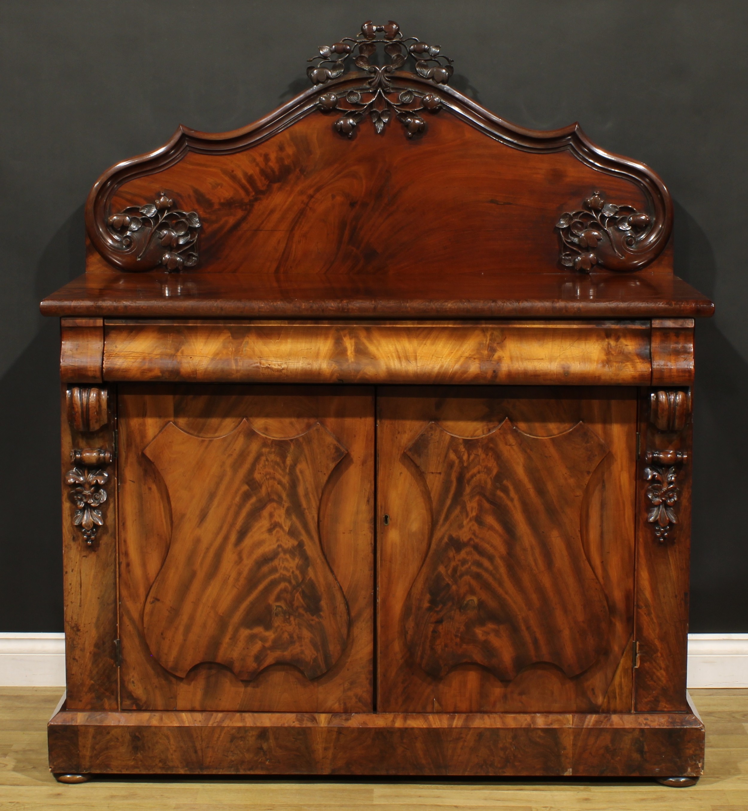 A Victorian flame mahogany buffet serving cabinet or sideboard, slightly oversailing top with shaped - Image 2 of 6