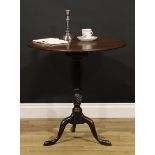 A 19th century mahogany tripod occasional table, one-piece circular tilting top, turned parcel-