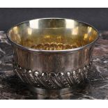 An 18th/19th century silver half-fluted bowl, gilt interior, 9.5cm diam, struckj three times with