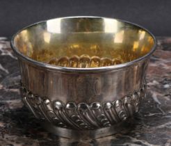 An 18th/19th century silver half-fluted bowl, gilt interior, 9.5cm diam, struckj three times with