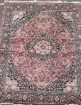 An Indian silk carpet, blue and pink, 361 x 276 cm
