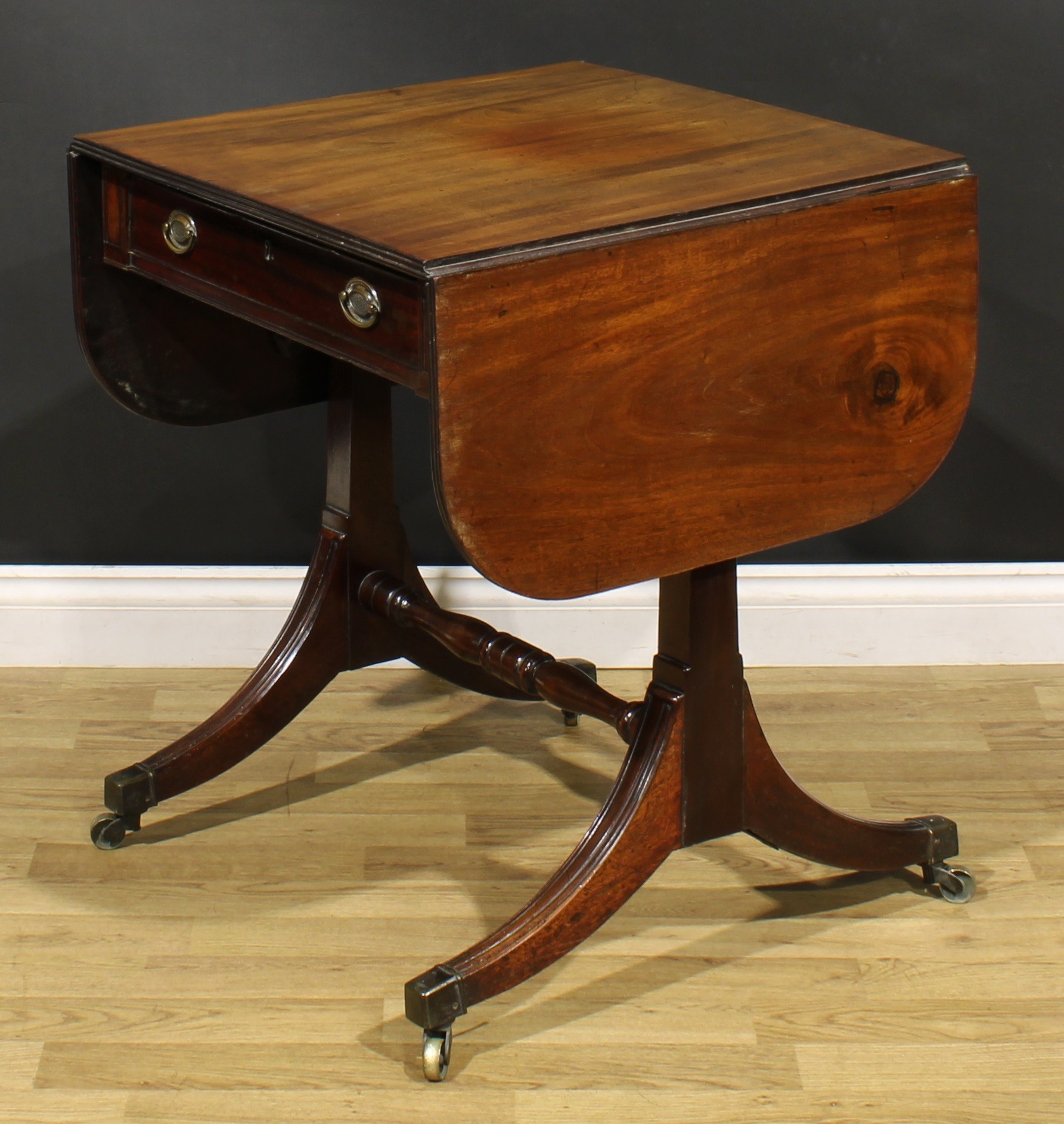 A 19th century mahogany sofa table, rounded rectangular top with fall leaves above a frieze - Image 6 of 7