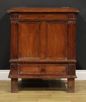 An 18th century Continental cherry vestment chest, hinged top enclosing a pair of compartments,