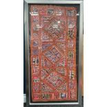 An Indian hand made woollen and cotton mat/wall hanging, some small mirrored glass inclusions, early