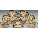 A Royal Crown Derby Imari 2451 pattern teapot, year cypher for 1931, sucrier and cover, milk jug,