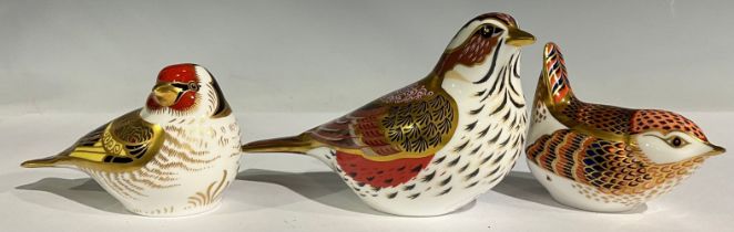A Royal Crown Derby paperweight, Redwing, Collector's Guild, gold stopper; others, Goldfinch, gold