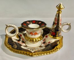 A Royal Crown Derby 1128 Old Imari pattern chamberstick and snuffer, first quality
