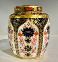 A Royal Crown Derby 1128 Old Imari pattern ginger jar and cover, solid gold band, 11cm high,