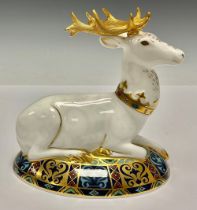 A Royal Crown Derby paperweight, The White Hart Heraldic Stag, third in a series inspired by