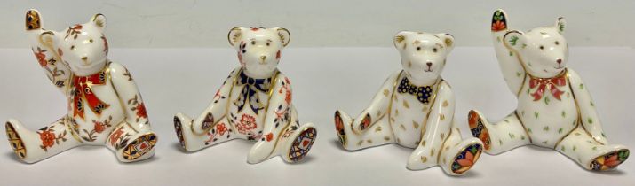 A set of four Royal Crown Derby miniature bears, Edward Bear, Victoria, Alice and William, all