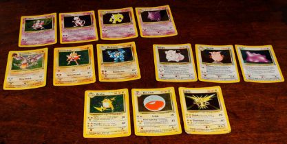 Pokemon, Pokemon Trading Cards – a collection of ungraded holographic foil trading cards, from the