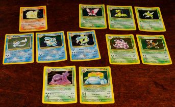 Pokemon, Pokemon Trading Cards – a collection of ungraded holographic foil trading cards, from the