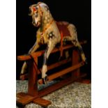 An English wooden rocking Horse, of small proportions, probably manufactured by Collinson & Sons