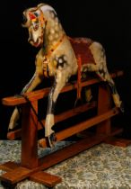 An English wooden rocking Horse, of small proportions, probably manufactured by Collinson & Sons