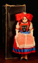 A Simon & Halbig (Germany) bisque shoulder head Alsace costume doll, the bisque shoulder head