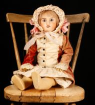 A Jules Verlingue (France) bisque head and painted composition bodied doll, the bisque head inset