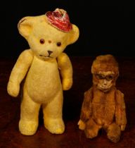 Juvenalia - a Schuco (Germany) brown mohair 'Yes/No' novelty miniature Monkey, wearing a pair of