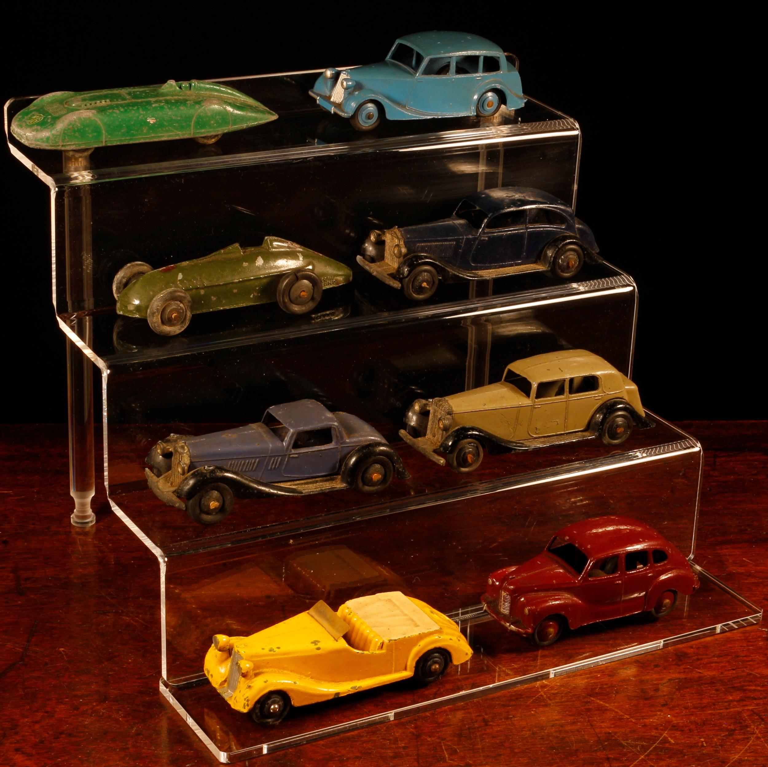 A collection of unboxed Dinky Toys diecast model cars, comprising 30c Daimler, fawn body with