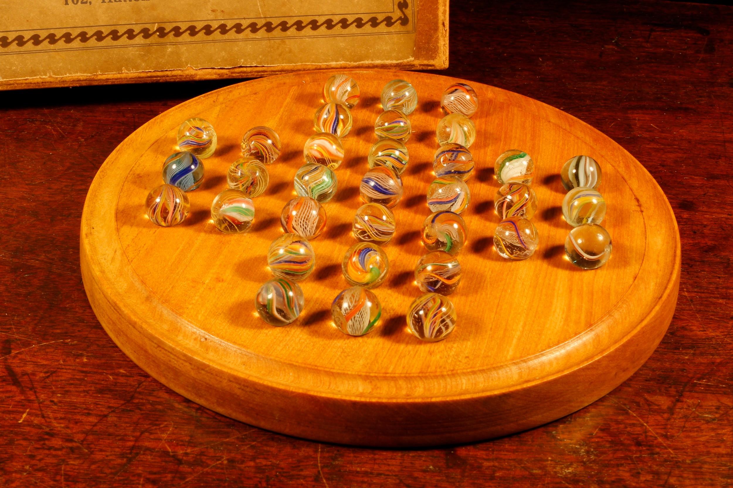 Parlour Games - a John Jaques & Son Ltd. circular solitaire board, comprising thirty three glass - Image 2 of 2