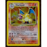 Pokemon, Pokemon Trading Cards – a Charizard 4/102 holographic foil trading card with shadow, from