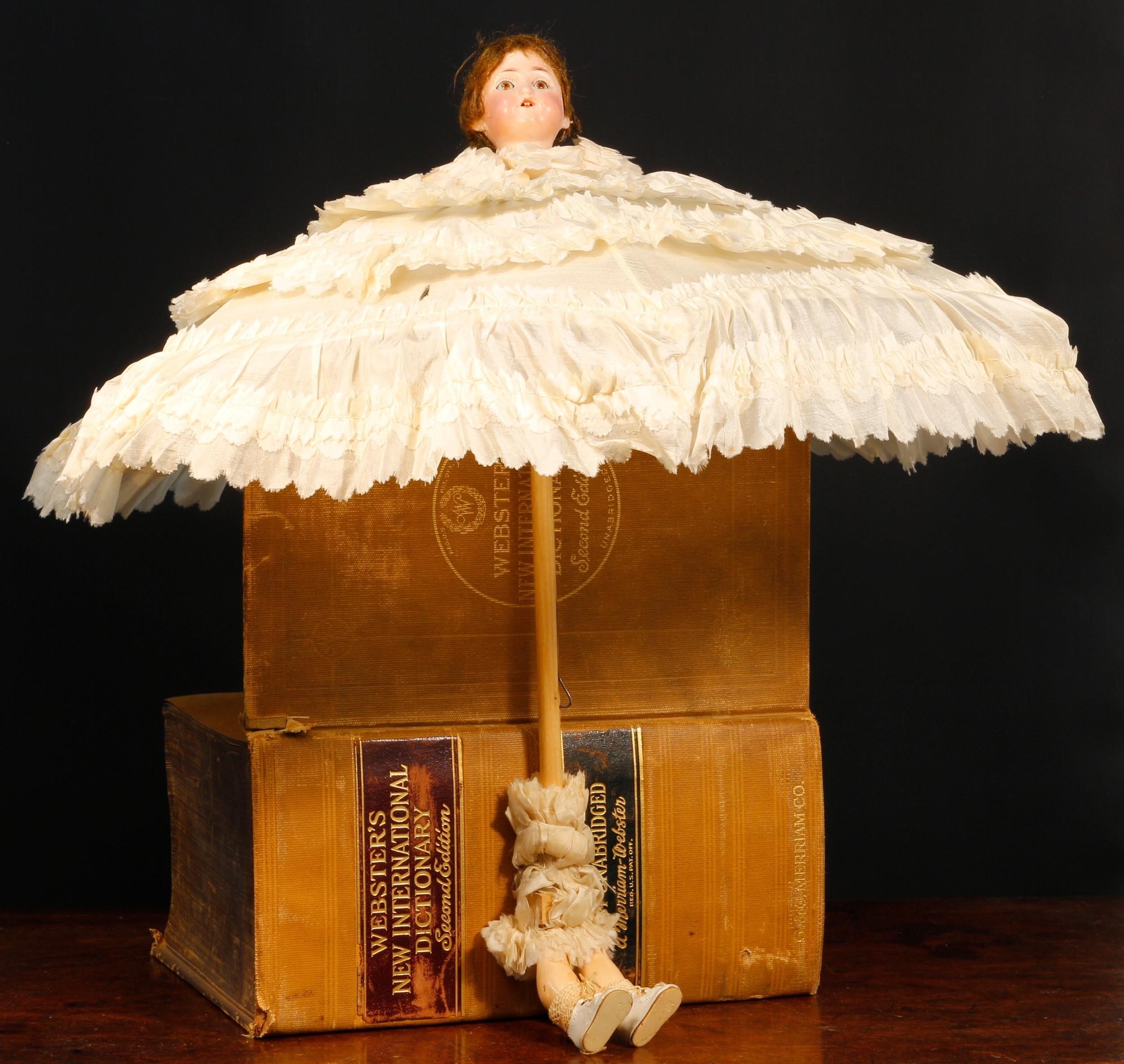 A Catterfelder Trautmann/Catterfelder Puppenfabrik (Germany) bisque head novelty parasol doll, the