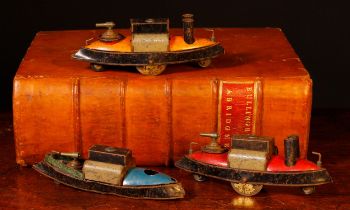 An early 20th century tinplate Penny toy, in the form of a warship on wheels, red, grey and black