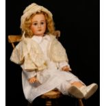 A Simon & Halbig (Germany) bisque head and painted composition bodied doll, the bisque head inset