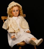 A Simon & Halbig (Germany) bisque head and painted composition bodied doll, the bisque head inset