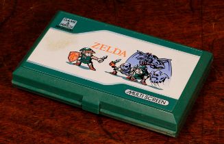 Retro Gaming & Technology - a Nintendo Zelda 'game and watch' multi screen gaming device, Model No.