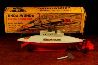 A 1940's Sutcliffe Model tinplate and clockwork Unda-Wunda diving submarine, grey and red body