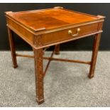A George III Revival mahogany lamp table, 64cm high x 65.5cm x 65.5cm.