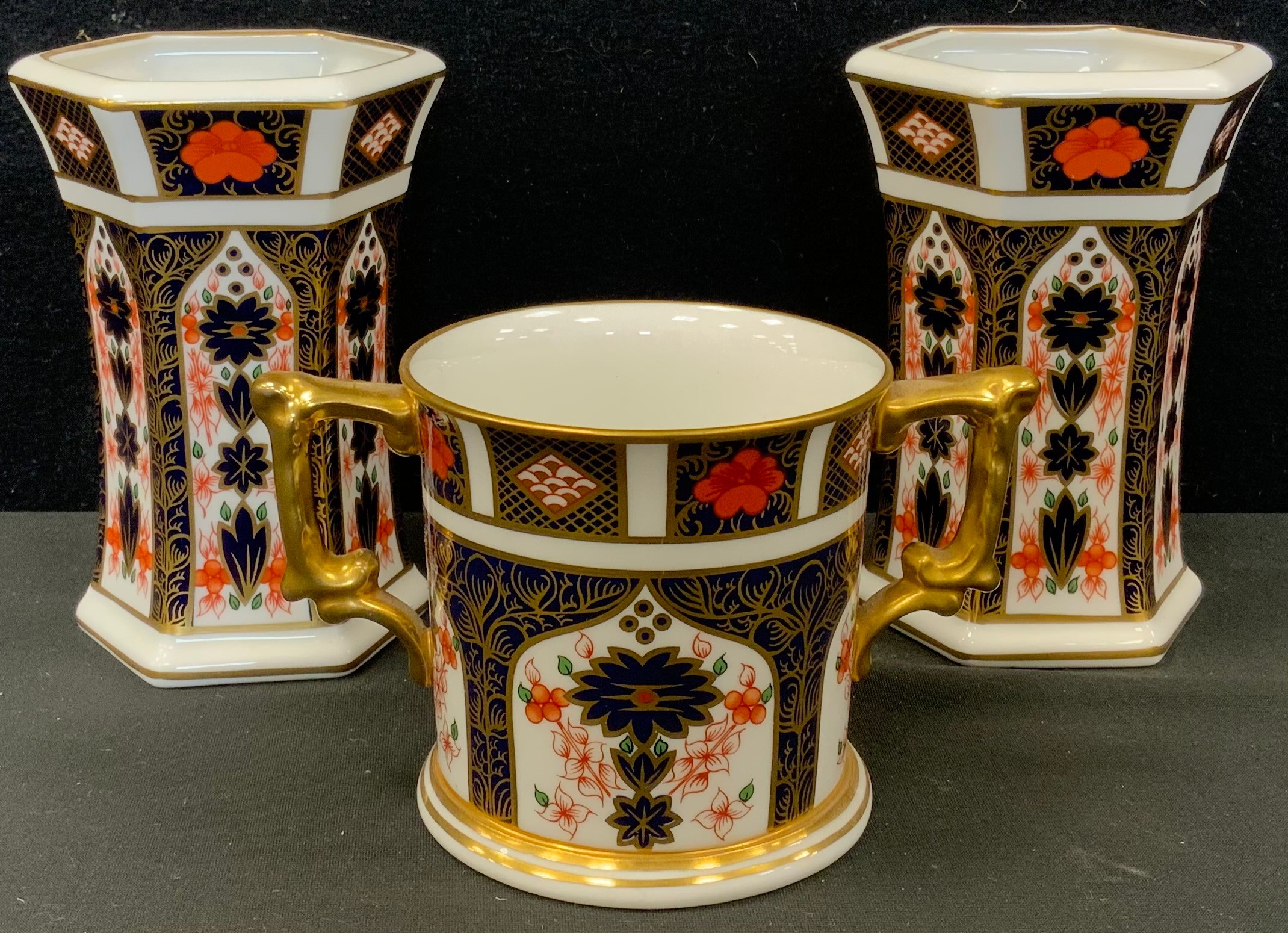 Royal Crown Derby - a pair of 1128 Imari waisted hexagonal vases, 11.5cm high, similar twin