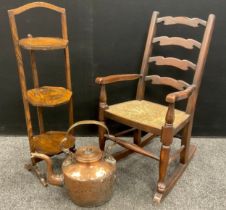 An Edwardian folding three tier cake stand, a small size Childs ladder back Rocking chair; large