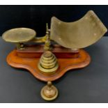 A set of W.White and Son Makers postage scales, conforming brass weights