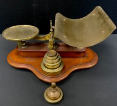 A set of W.White and Son Makers postage scales, conforming brass weights