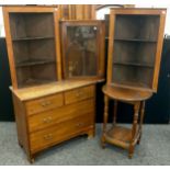 A pair of early 20th century mahogany corner shelving units, wall-mounted, two tiers of shaped