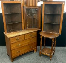 A pair of early 20th century mahogany corner shelving units, wall-mounted, two tiers of shaped