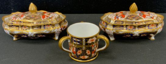 Royal Crown Derby - a pair of miniature 2451 pattern shaped trinket dishes and covers, printed