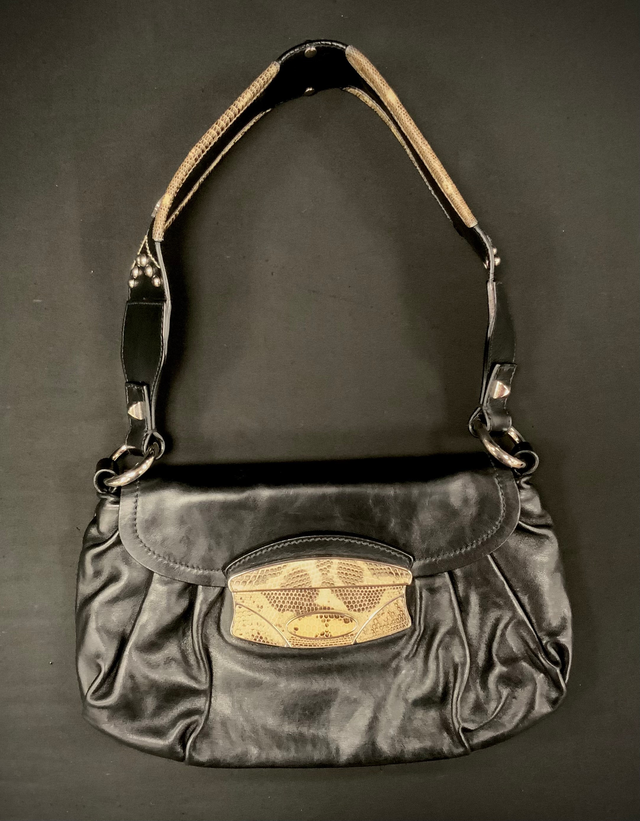 A Prada black leather handbag, top handle, snake skin effect slide catch fittings and shoulder