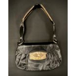 A Prada black leather handbag, top handle, snake skin effect slide catch fittings and shoulder