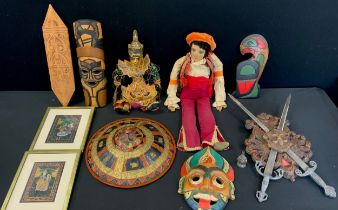 A Burmese or Thai marionette puppet doll, as a warrior; assorted wall masks, pair of painted panels,