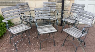 Garden Furniture - a set of six wrought iron framed slatted wooden folding garden chairs, each