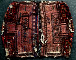 Persian Lori or Qashgai type camel bag, Namakdan shaped panels, in tones of red and blue, 125cm x