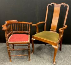 A Queen Anne style walnut and mahogany armchair, 110cm high x 62.5cm wide x 49cm deep; an