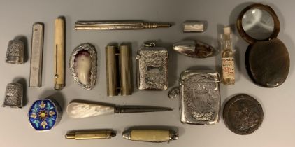 An Edwardian silver vesta case, Birmingham 1901; another Chester 1905; white metal mounted shell