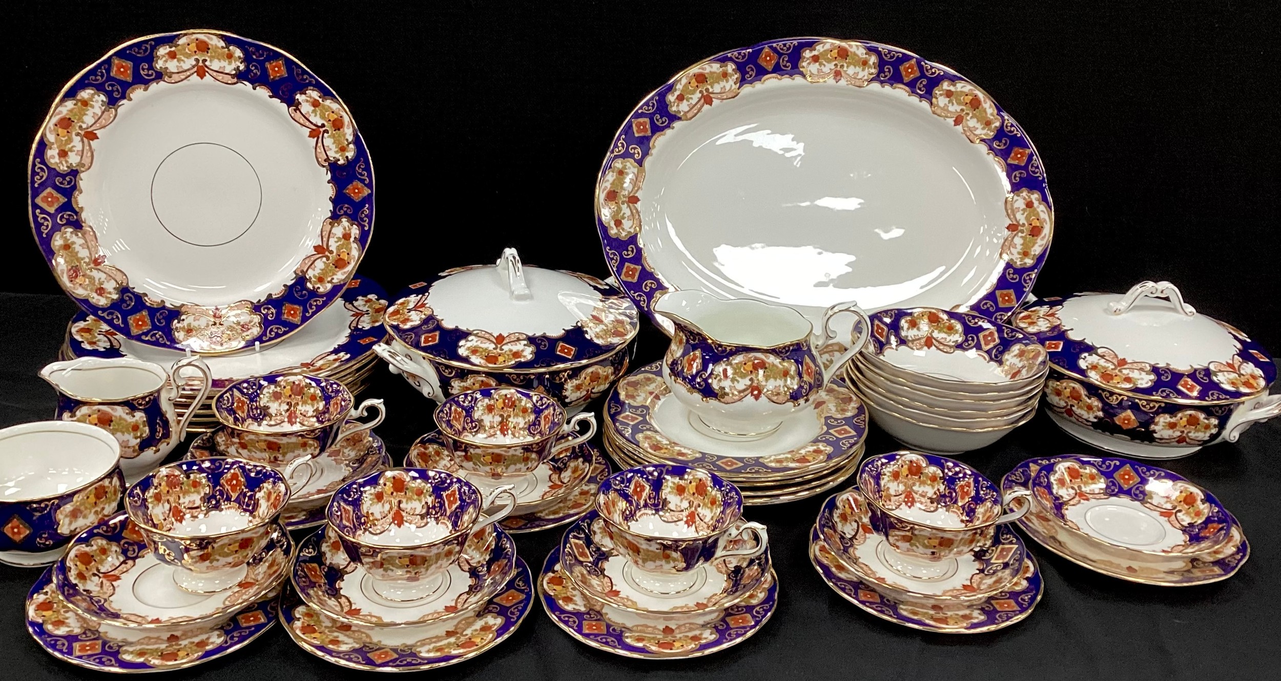 A Royal Albert ‘Heirloom’ pattern table service for six including; six tea cups and saucers, side