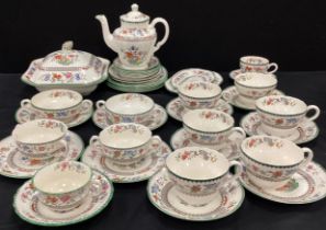 A part Spode ‘Chinese Rose’ tea service for six including; six tea cups and saucers, a tea pot, four