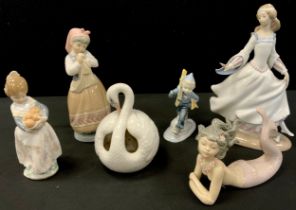 Lladro figures including; Mermaid, 16cm long, globular formed swan, 14cm high, Dashing lady, 25cm